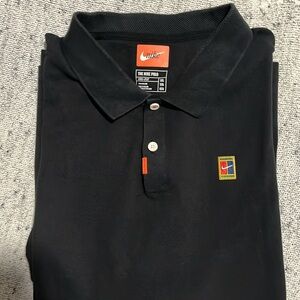 The Nike Polo black
